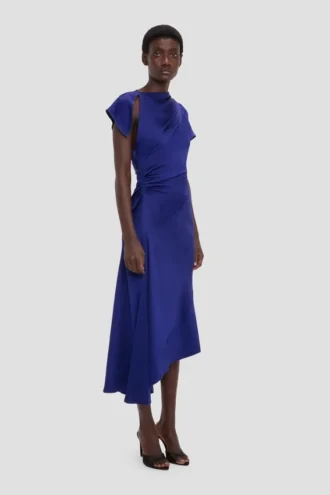 Asymmetric twist dress in bright indigo