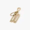 Charm keyring in gold
