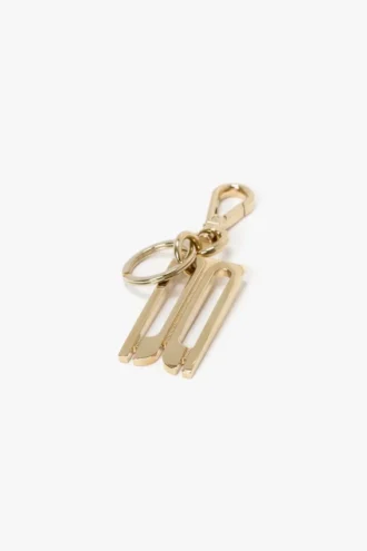Charm keyring in gold