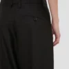 Curved leg trouser in black