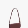 Dorian pocket bag in burgundy leather