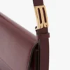 Dorian pocket bag in burgundy leather