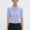 Frill polo top in cloud blue