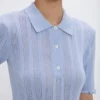 Frill polo top in cloud blue