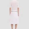 Frill polo top in white