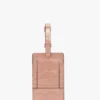Luggage tag in blush pink croc embossed leather