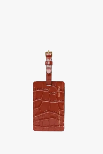 Luggage tag in brick red croc embossed leather