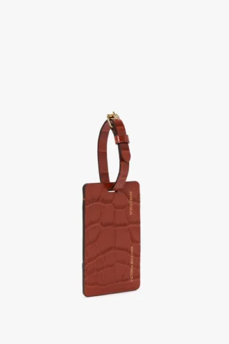 Luggage tag in brick red croc embossed leather